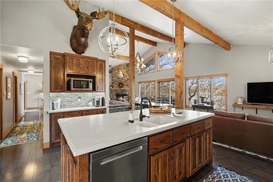 This lake front home in sought after Sugar Valley Lakes sits on on Sugar Valley Lakes Golf Course in Kansas - for sale on GolfHomes.com, golf home, golf lot