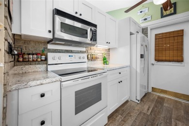 Tucked away on a quaint cul-de-sac, this WATERFRONT POOL HOME in on Duffys Golf Center in Florida - for sale on GolfHomes.com, golf home, golf lot