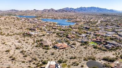 Imagine waking up each morning surrounded by mountain views on Estrella Mountain Ranch Golf Course in Arizona - for sale on GolfHomes.com, golf home, golf lot