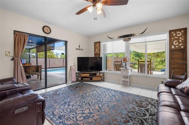 Tucked away on a quaint cul-de-sac, this WATERFRONT POOL HOME in on Duffys Golf Center in Florida - for sale on GolfHomes.com, golf home, golf lot