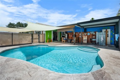 Tucked away on a quaint cul-de-sac, this WATERFRONT POOL HOME in on Duffys Golf Center in Florida - for sale on GolfHomes.com, golf home, golf lot
