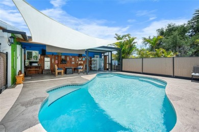 Tucked away on a quaint cul-de-sac, this WATERFRONT POOL HOME in on Duffys Golf Center in Florida - for sale on GolfHomes.com, golf home, golf lot