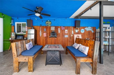 Tucked away on a quaint cul-de-sac, this WATERFRONT POOL HOME in on Duffys Golf Center in Florida - for sale on GolfHomes.com, golf home, golf lot