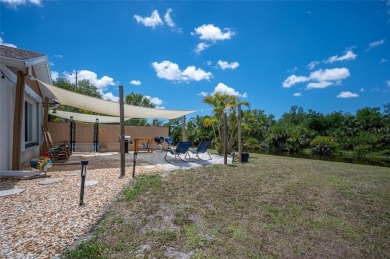 Tucked away on a quaint cul-de-sac, this WATERFRONT POOL HOME in on Duffys Golf Center in Florida - for sale on GolfHomes.com, golf home, golf lot