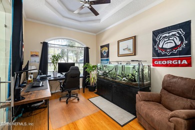 Beautiful home in the highly desirable Eagle Harbor community on Eagle Harbor Golf Club in Florida - for sale on GolfHomes.com, golf home, golf lot