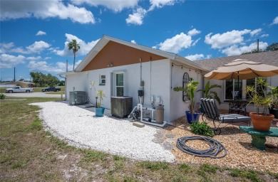 Tucked away on a quaint cul-de-sac, this WATERFRONT POOL HOME in on Duffys Golf Center in Florida - for sale on GolfHomes.com, golf home, golf lot