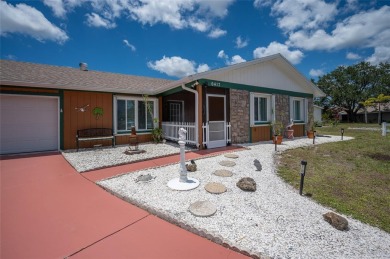 Tucked away on a quaint cul-de-sac, this WATERFRONT POOL HOME in on Duffys Golf Center in Florida - for sale on GolfHomes.com, golf home, golf lot