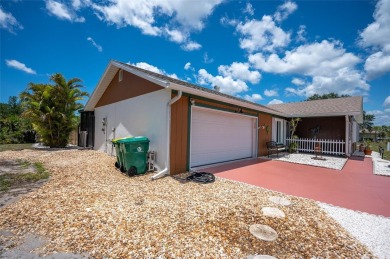 Tucked away on a quaint cul-de-sac, this WATERFRONT POOL HOME in on Duffys Golf Center in Florida - for sale on GolfHomes.com, golf home, golf lot
