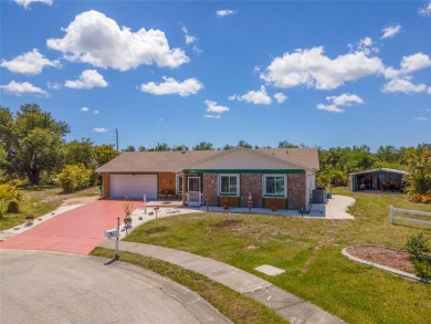 Tucked away on a quaint cul-de-sac, this WATERFRONT POOL HOME in on Duffys Golf Center in Florida - for sale on GolfHomes.com, golf home, golf lot