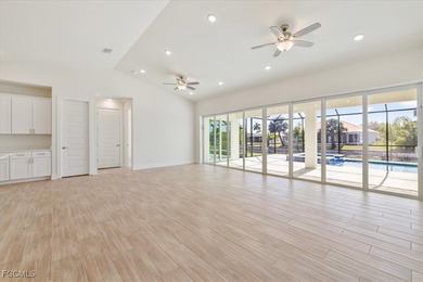 This new construction, move in ready home has it all, a rare on Royal Tee Country Club in Florida - for sale on GolfHomes.com, golf home, golf lot