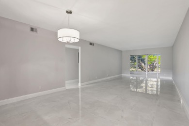FULLY RENOVATED 2-Bedroom Condo in the Heart of Wynmoor! This on Wynmoor Golf Course in Florida - for sale on GolfHomes.com, golf home, golf lot