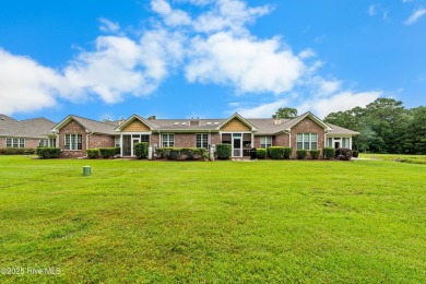 Immaculately maintained and thoughtfully updated townhome in on Magnolia Greens Golf Plantation in North Carolina - for sale on GolfHomes.com, golf home, golf lot