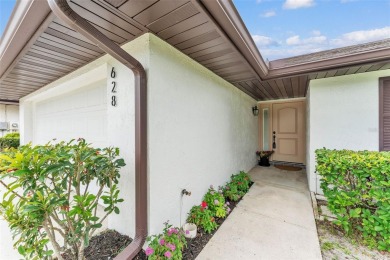 One or more photo(s) has been virtually staged. LIVE THE FLORIDA on Cypresswood Golf and Country Club in Florida - for sale on GolfHomes.com, golf home, golf lot