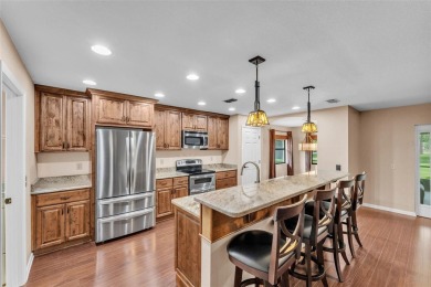 One or more photo(s) has been virtually staged. LIVE THE FLORIDA on Cypresswood Golf and Country Club in Florida - for sale on GolfHomes.com, golf home, golf lot