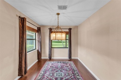 One or more photo(s) has been virtually staged. LIVE THE FLORIDA on Cypresswood Golf and Country Club in Florida - for sale on GolfHomes.com, golf home, golf lot
