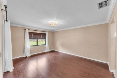 One or more photo(s) has been virtually staged. LIVE THE FLORIDA on Cypresswood Golf and Country Club in Florida - for sale on GolfHomes.com, golf home, golf lot
