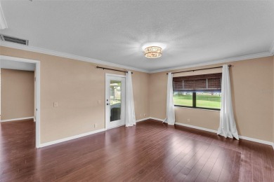 One or more photo(s) has been virtually staged. LIVE THE FLORIDA on Cypresswood Golf and Country Club in Florida - for sale on GolfHomes.com, golf home, golf lot