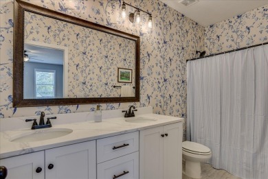 Welcome to this stunning 6-bedroom, 4-bathroom home nestled in on Bartram Trail Golf Club in Georgia - for sale on GolfHomes.com, golf home, golf lot