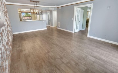 Model Condo-Step into this Stunning Corner 2-Bedroom 2-Bath on Oriole Golf and Tennis Club in Florida - for sale on GolfHomes.com, golf home, golf lot
