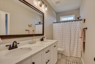 Welcome to this stunning 6-bedroom, 4-bathroom home nestled in on Bartram Trail Golf Club in Georgia - for sale on GolfHomes.com, golf home, golf lot