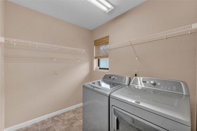 One or more photo(s) has been virtually staged. LIVE THE FLORIDA on Cypresswood Golf and Country Club in Florida - for sale on GolfHomes.com, golf home, golf lot