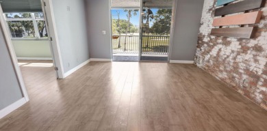 Model Condo-Step into this Stunning Corner 2-Bedroom 2-Bath on Oriole Golf and Tennis Club in Florida - for sale on GolfHomes.com, golf home, golf lot