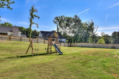 Welcome to this stunning 6-bedroom, 4-bathroom home nestled in on Bartram Trail Golf Club in Georgia - for sale on GolfHomes.com, golf home, golf lot