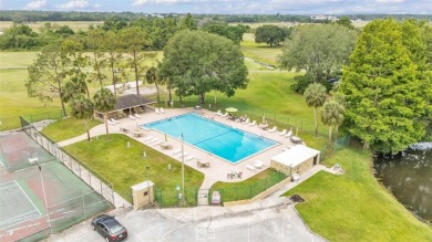 One or more photo(s) has been virtually staged. LIVE THE FLORIDA on Cypresswood Golf and Country Club in Florida - for sale on GolfHomes.com, golf home, golf lot