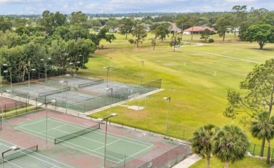 One or more photo(s) has been virtually staged. LIVE THE FLORIDA on Cypresswood Golf and Country Club in Florida - for sale on GolfHomes.com, golf home, golf lot