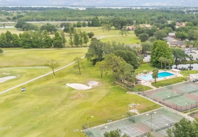 One or more photo(s) has been virtually staged. LIVE THE FLORIDA on Cypresswood Golf and Country Club in Florida - for sale on GolfHomes.com, golf home, golf lot