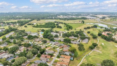 One or more photo(s) has been virtually staged. LIVE THE FLORIDA on Cypresswood Golf and Country Club in Florida - for sale on GolfHomes.com, golf home, golf lot