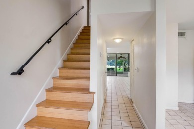 Welcome to this charming 2-bedroom townhouse nestled in a serent on Fountains Golf and Country Club in Florida - for sale on GolfHomes.com, golf home, golf lot