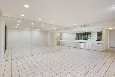 Welcome to this charming 2-bedroom townhouse nestled in a serent on Fountains Golf and Country Club in Florida - for sale on GolfHomes.com, golf home, golf lot