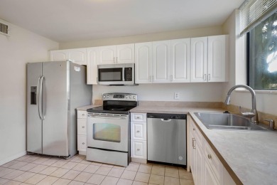 Welcome to this charming 2-bedroom townhouse nestled in a serent on Fountains Golf and Country Club in Florida - for sale on GolfHomes.com, golf home, golf lot