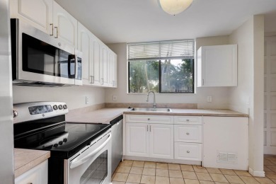 Welcome to this charming 2-bedroom townhouse nestled in a serent on Fountains Golf and Country Club in Florida - for sale on GolfHomes.com, golf home, golf lot