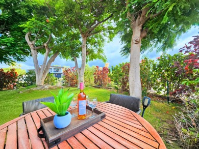Hidden from the road by mature landscaping (terraced lava rock on Waikoloa Village Golf Club in Hawaii - for sale on GolfHomes.com, golf home, golf lot