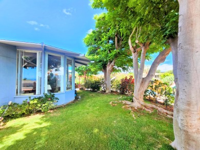 Hidden from the road by mature landscaping (terraced lava rock on Waikoloa Village Golf Club in Hawaii - for sale on GolfHomes.com, golf home, golf lot