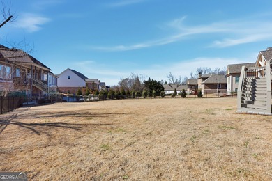 Simple luxury at its finest! Discover this rare ranch plan on Traditions of Braselton Golf Club in Georgia - for sale on GolfHomes.com, golf home, golf lot
