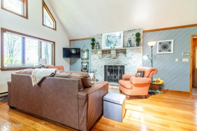 Wake up to the sounds of nature, unwind by the fire, and take in on The Hideout Golf in Pennsylvania - for sale on GolfHomes.com, golf home, golf lot