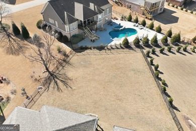 Simple luxury at its finest! Discover this rare ranch plan on Traditions of Braselton Golf Club in Georgia - for sale on GolfHomes.com, golf home, golf lot