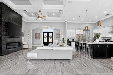 Stunning custom home located on a quiet cul-de-sac in the on St. Lucie Trail Golf Club in Florida - for sale on GolfHomes.com, golf home, golf lot