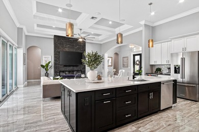 Stunning custom home located on a quiet cul-de-sac in the on St. Lucie Trail Golf Club in Florida - for sale on GolfHomes.com, golf home, golf lot