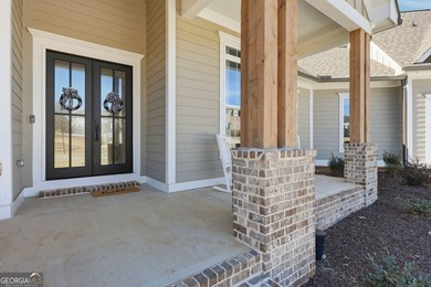 Simple luxury at its finest! Discover this rare ranch plan on Traditions of Braselton Golf Club in Georgia - for sale on GolfHomes.com, golf home, golf lot