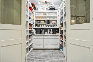 Stunning custom home located on a quiet cul-de-sac in the on St. Lucie Trail Golf Club in Florida - for sale on GolfHomes.com, golf home, golf lot