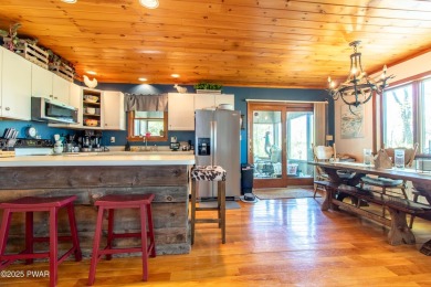 Wake up to the sounds of nature, unwind by the fire, and take in on The Hideout Golf in Pennsylvania - for sale on GolfHomes.com, golf home, golf lot