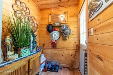 Wake up to the sounds of nature, unwind by the fire, and take in on The Hideout Golf in Pennsylvania - for sale on GolfHomes.com, golf home, golf lot