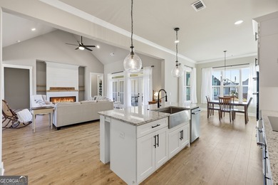 Simple luxury at its finest! Discover this rare ranch plan on Traditions of Braselton Golf Club in Georgia - for sale on GolfHomes.com, golf home, golf lot