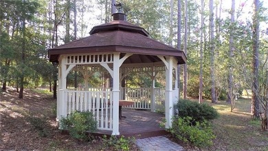 Close to town in Rainbow Springs Woodlands on a quiet Col-De-Sac on Rainbows End Golf Club in Florida - for sale on GolfHomes.com, golf home, golf lot