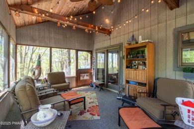 Wake up to the sounds of nature, unwind by the fire, and take in on The Hideout Golf in Pennsylvania - for sale on GolfHomes.com, golf home, golf lot