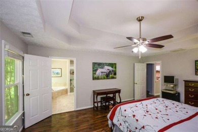 Tucked away on a serene, WOODED 2 ACRE LOT in a charming on Bentwater Golf Club in Georgia - for sale on GolfHomes.com, golf home, golf lot